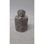 A late Victorian silver mounted scent bottle Samuel Mordan & Co London 1891 with heavy floral