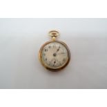 A small 18ct yellow gold double cased fob watch, 2.7cm case, seen working, approx 16.4 grams