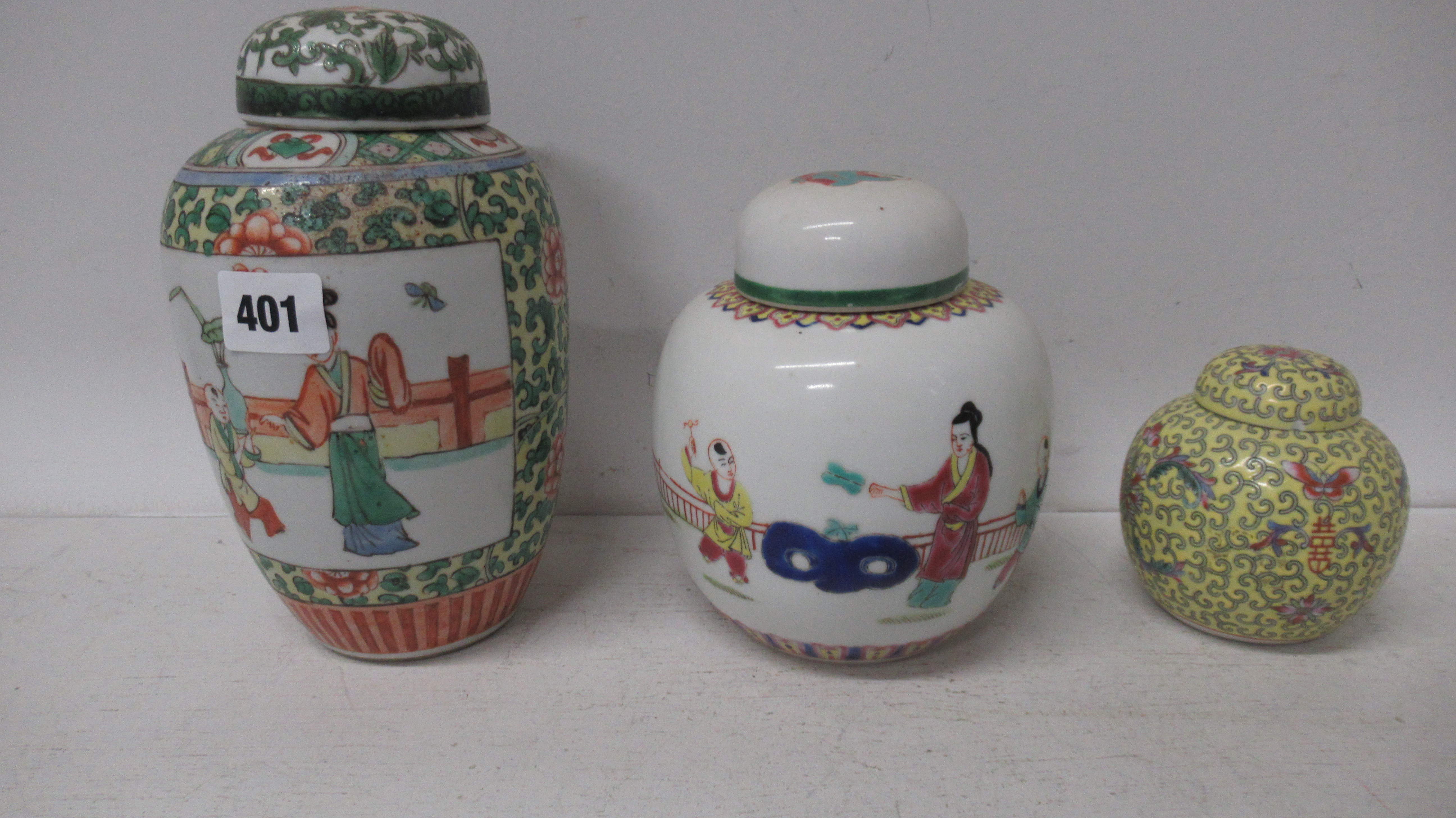 Four ginger jars with lids
