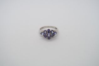 A 9ct white gold tanzanite and diamond ring, head size approx 16mm x 12mm, size O/P