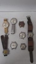 Three watches: Smiths Empire, 34mm case; R.A. Miles, 28mm case; Wyler 28mm case together with five