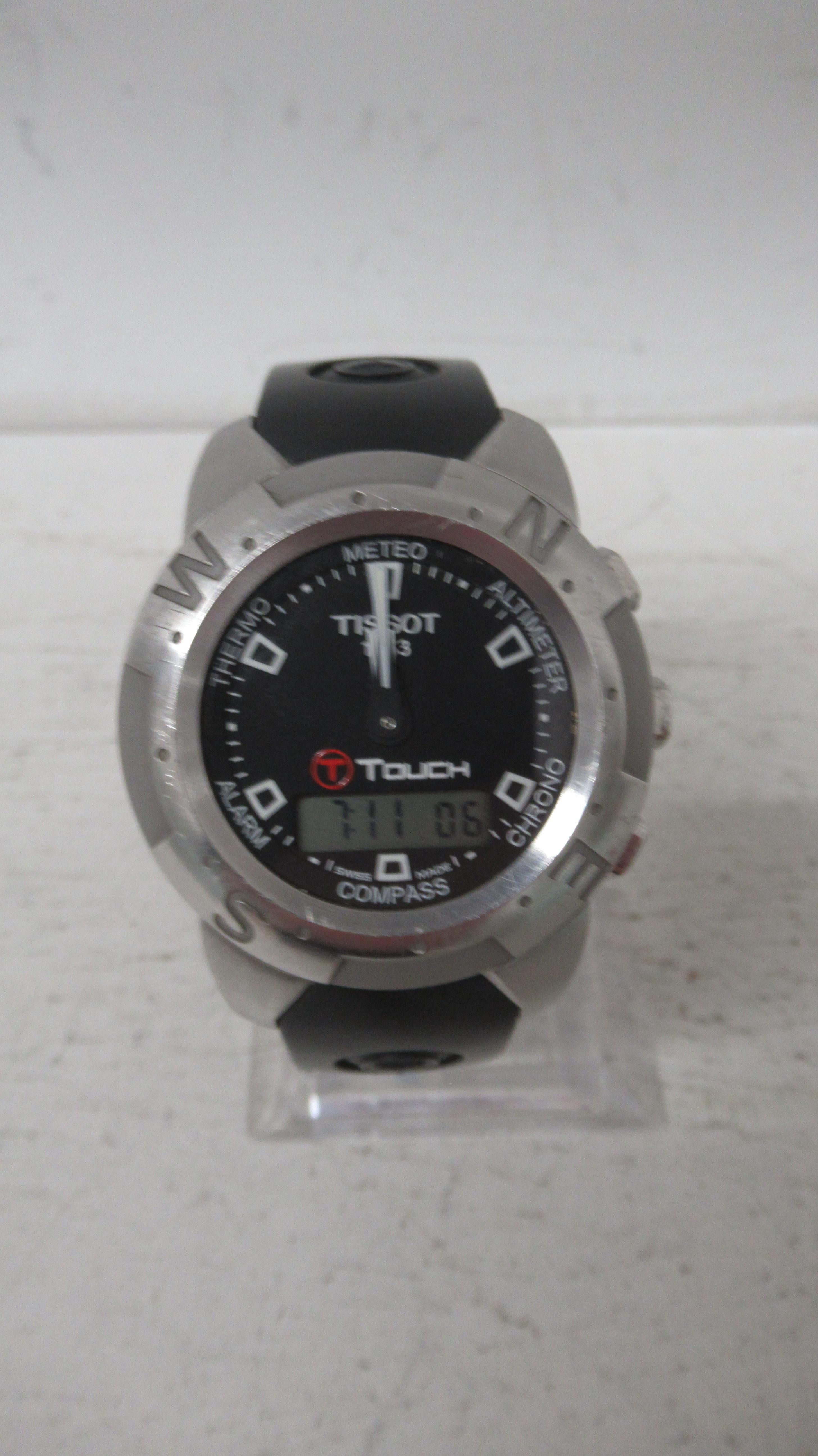 A Gents stainless steel Tissot Touch, case 40mm, with matching branded rubber strap and clasp,