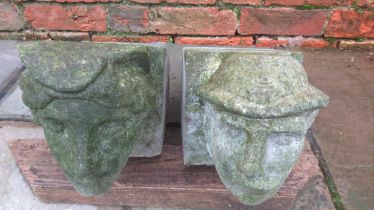 A pair of 19th century style cast stone corbels of a French lady and gentleman - Width 14cm x
