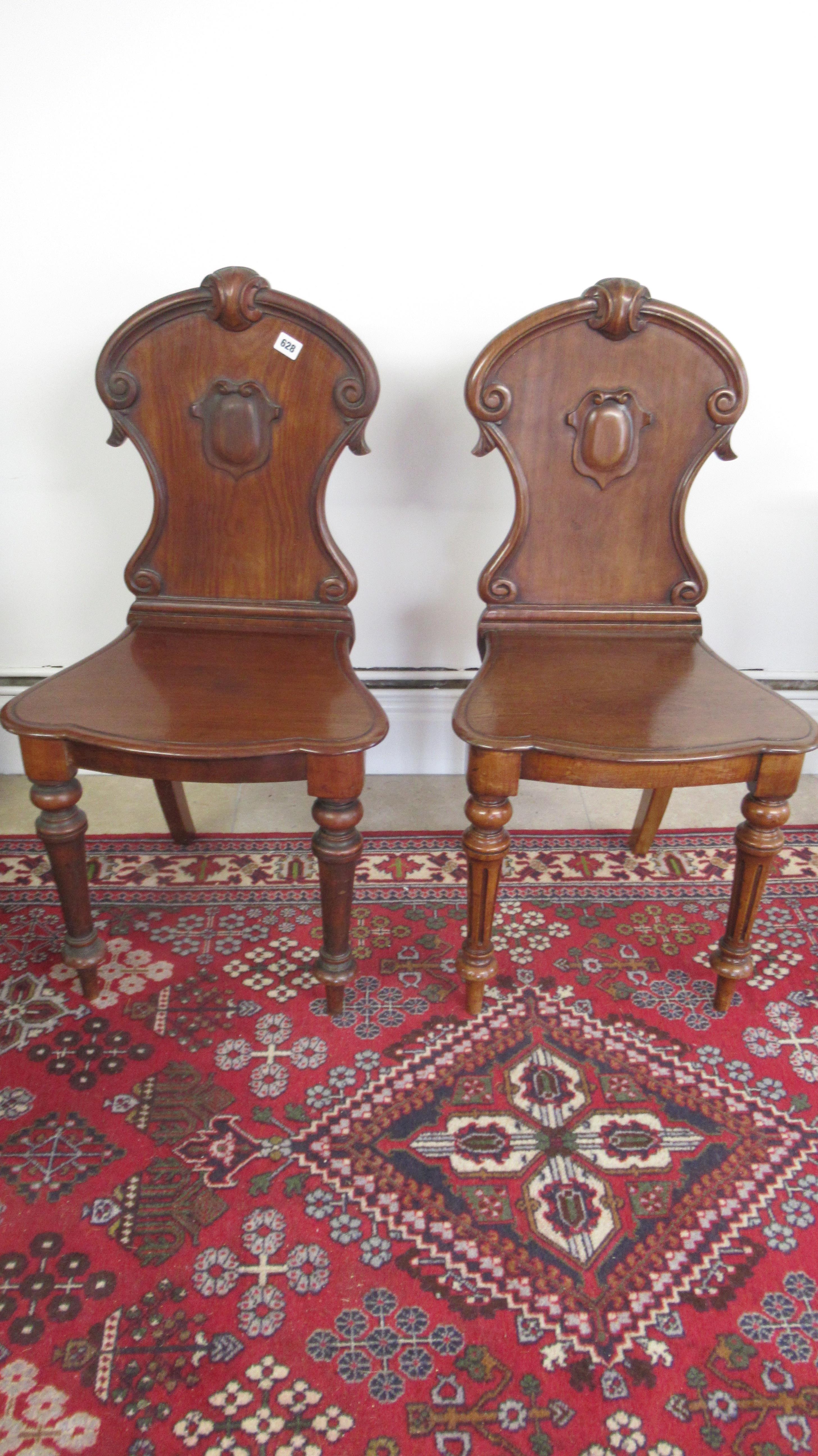 Two 19th century hall chairs, one with turned legs and one with reeded legs