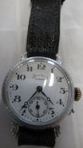 A ladies watch, with seconds on black leather strap - working in the saleroom - case size 28mm