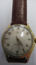 A gents Odeon auto with seconds on brown leather strap - working in the saleroom - case size 32mm