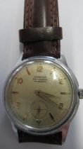 A gents Junghans Trilastic auto with seconds on brown leather strap - working in the saleroom - case