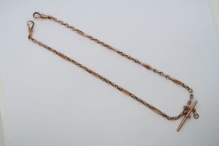 A hallmarked 9ct red gold watch chain with T-bar, 37cm long, approx 9 grams