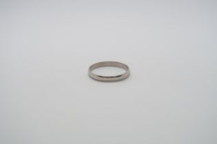 A platinum band ring, 23mm diameter, size S, approx 3.6 grams