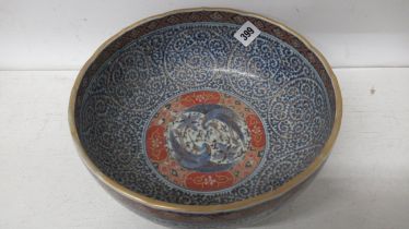 A Chinese bowl - Diameter 25cm - has been broken and glued back together some years ago