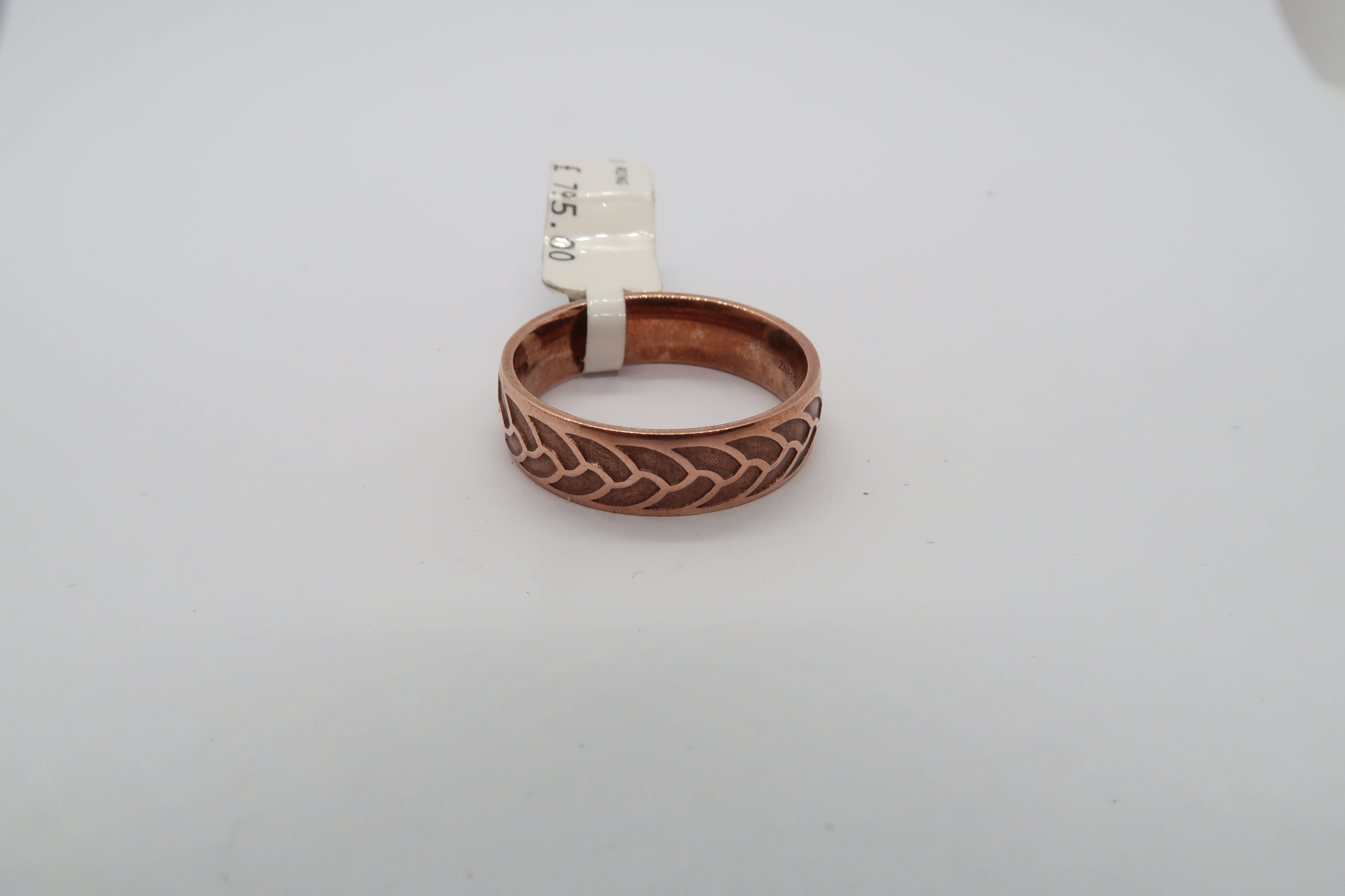 A 9ct rose gold wedding band - weight approx 6.3 grams - ring size T/U - ex jewellers stock, as