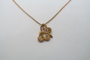 A hallmarked 9ct yellow gold butterfly pendant on a 9ct hallmarked chain, pendant 2cm set with
