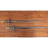 Two French 1874 pattern gras bayonets dated 1877 and 1879, 51cm blades with steel scabbards