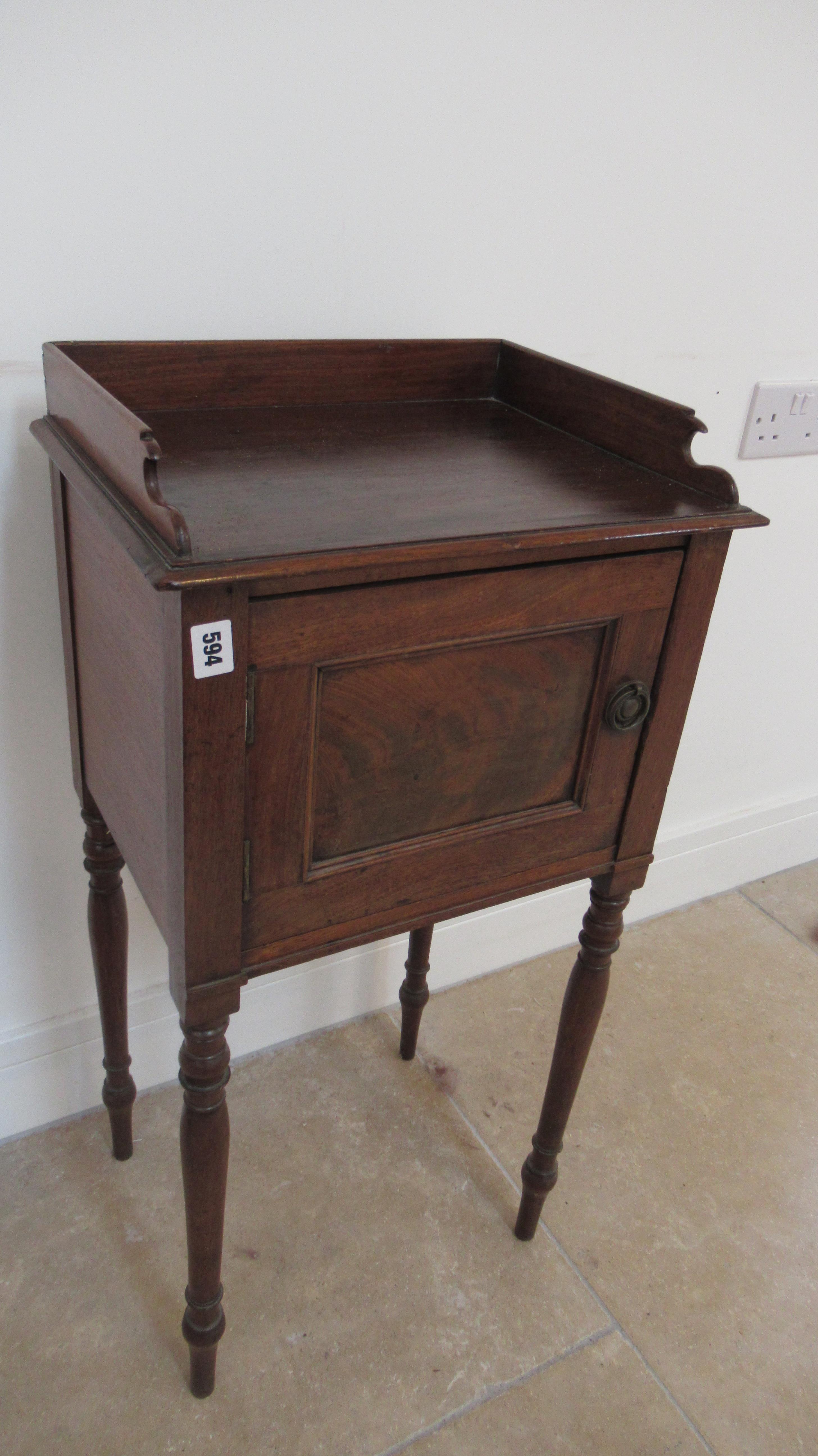 A 19th century mahogany bedside cupboard, 83cm high x 42cm wide