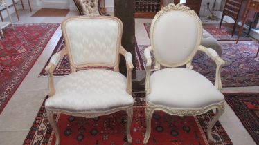 Two cream coloured bedroom chairs