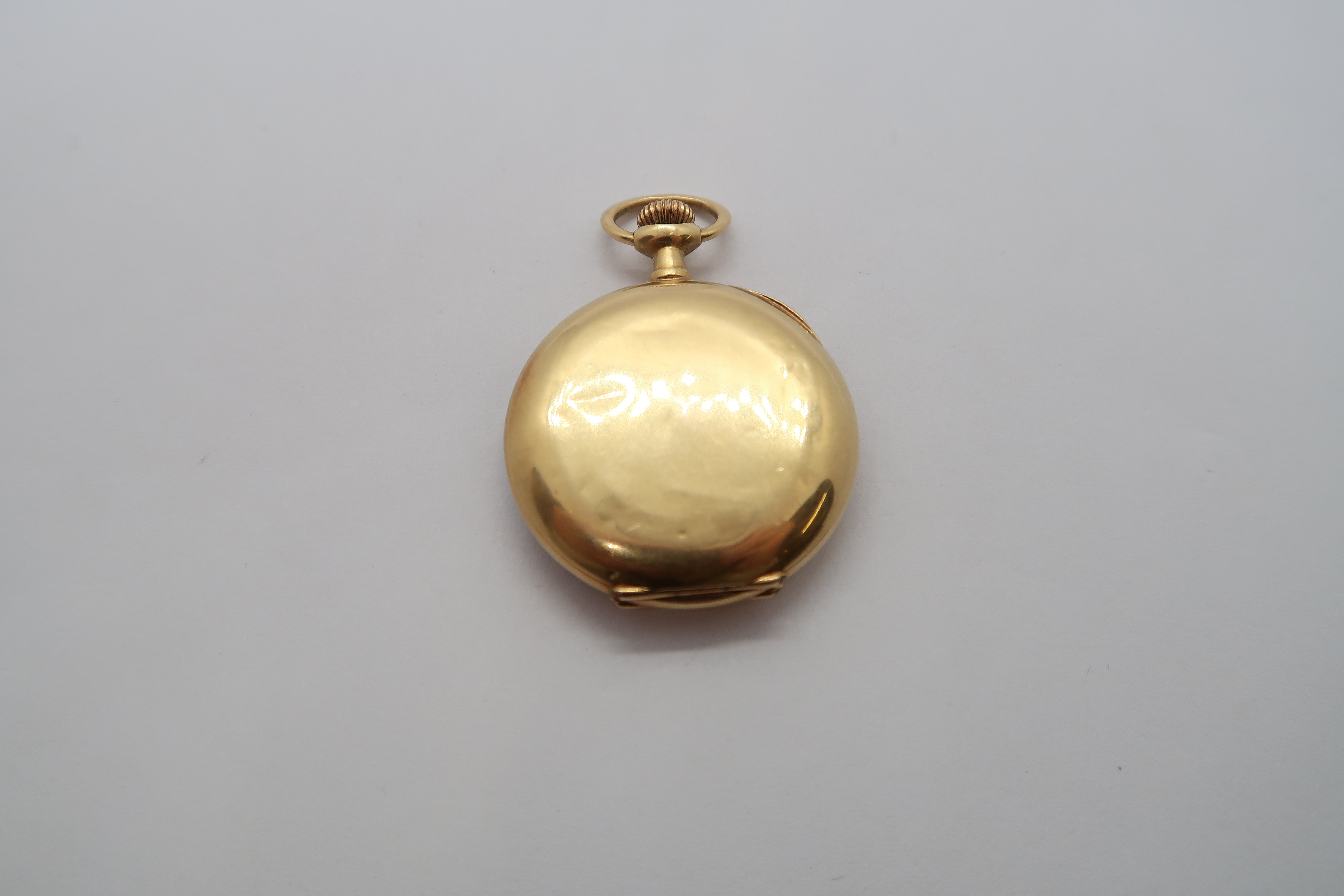 A small 18ct yellow gold double cased fob watch, 2.7cm case, seen working, approx 16.4 grams - Image 2 of 2