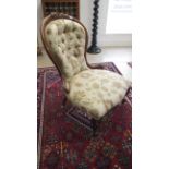 A 19th century mahogany nursing chair, nicely upholstered, in good condition