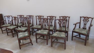 A set of 12 Georgian style mahogany dining chairs to include two carvers