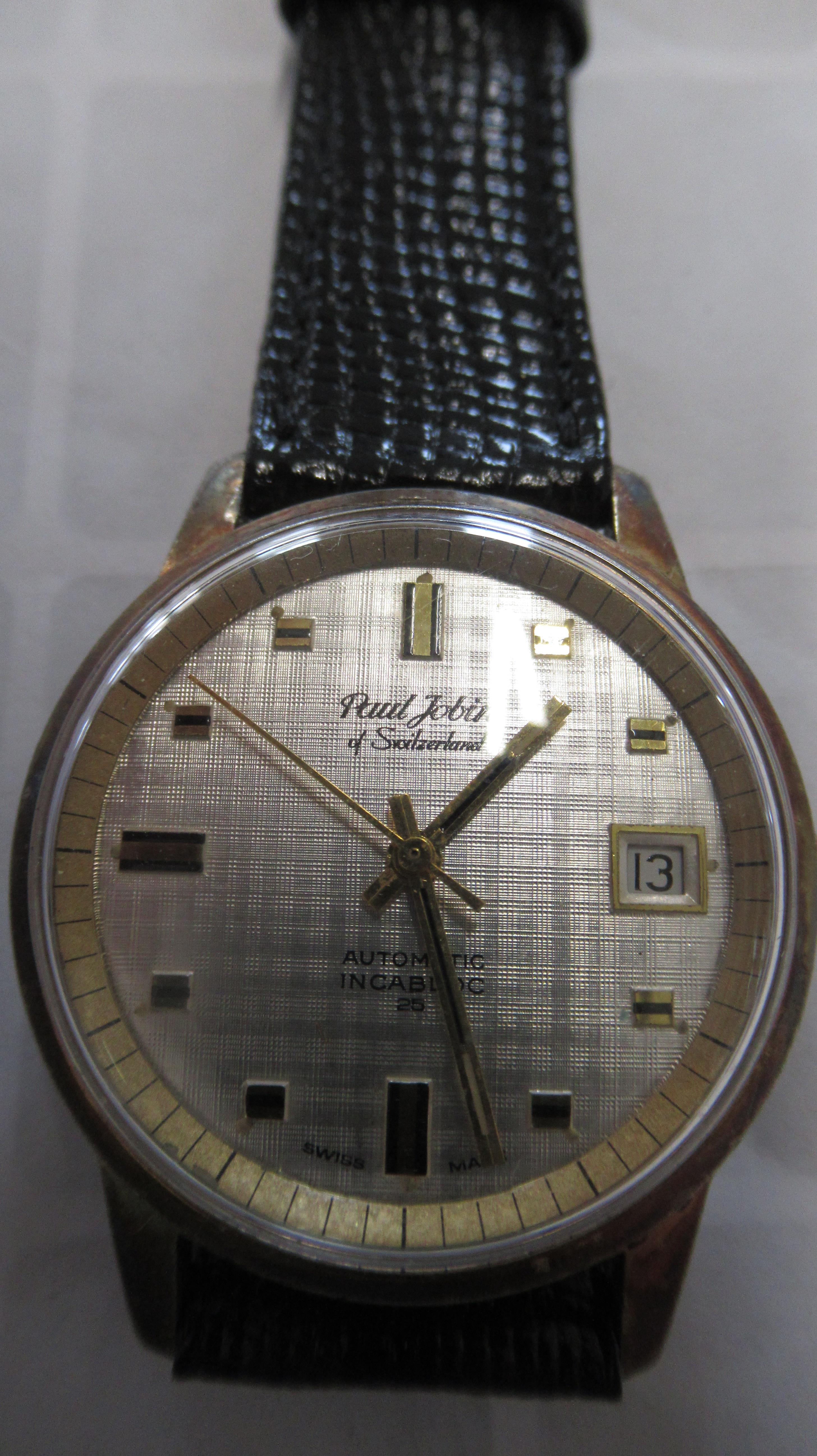 A gents Paul Jobin auto watch with date and seconds on black leather strap - working in the saleroom