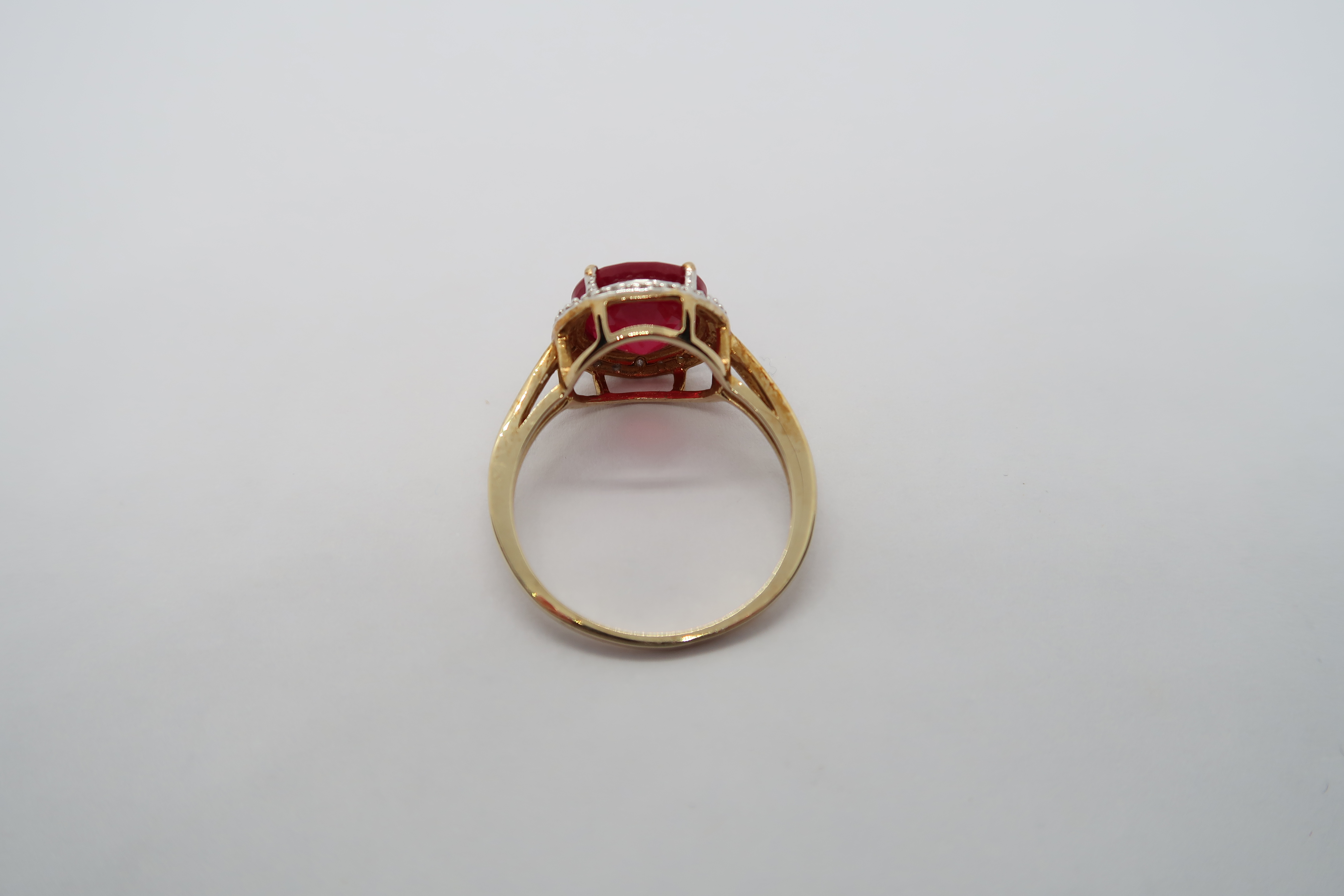 A 9ct yellow gold ruby and diamond ring, head size 12mm diameter, ring size N/O - Image 3 of 3