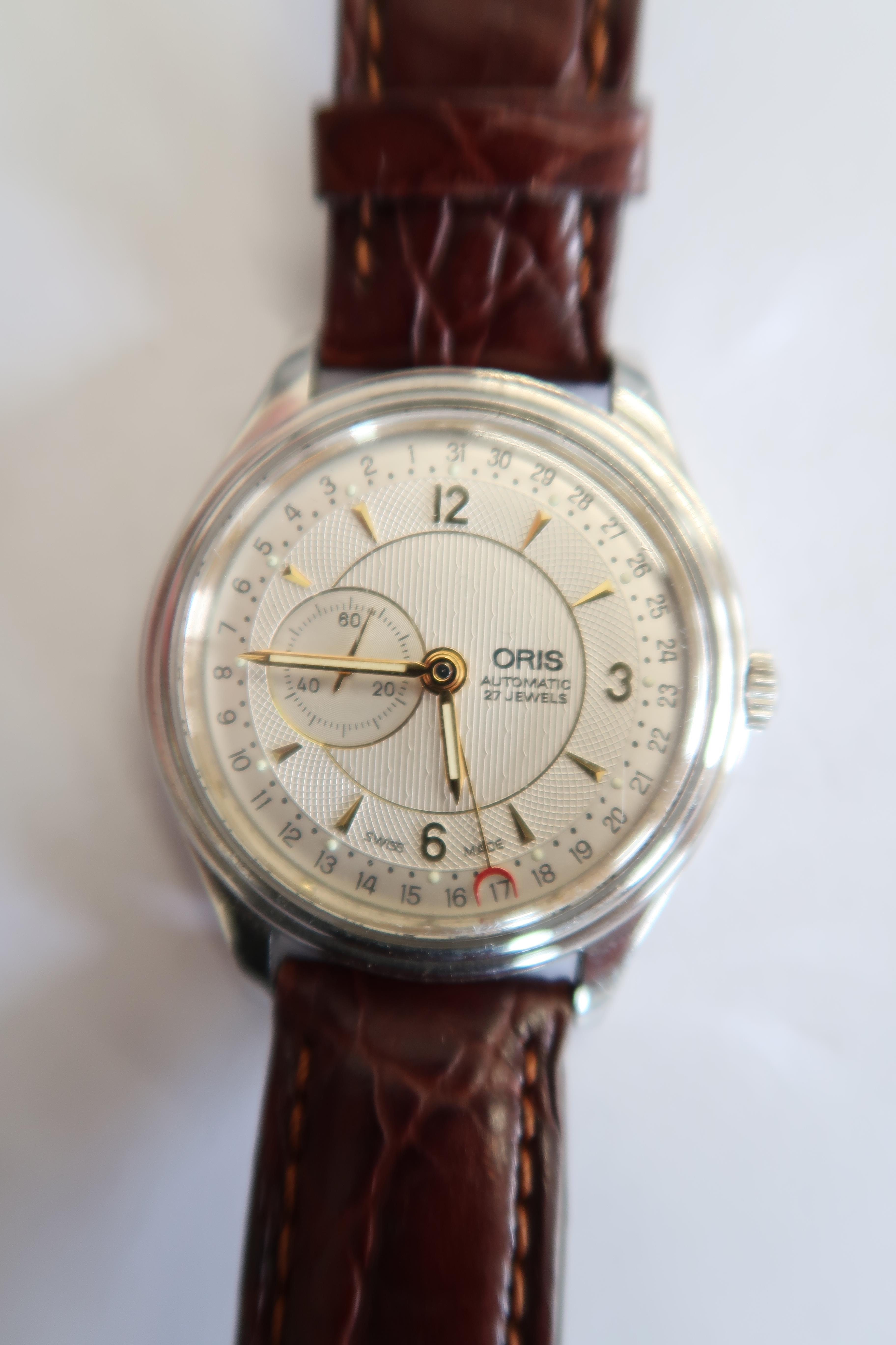 An Oris Gents automatic wristwatch with date and secondhand in its case with a good quality