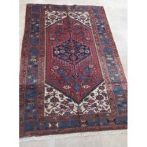 A hand knotted woollen Hamadan rug - 2.04m x 1.38m