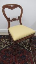 A 19th century balloon back chair