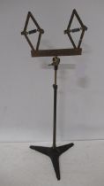 A brass and iron adjustable stand