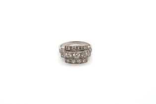 An Art Deco style platinum three row diamond ring with diamond shoulders - diamond weight approx 1.