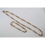 A hallmarked 9ct yellow gold trombone link chain and bracelet, chain 45cm, bracelet 18cm, total