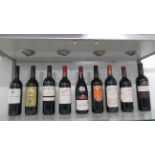 Nine bottles of red wine including Cotes du Rhone, Rioja, Claret