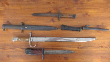 Five bayonets various lengths