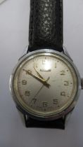 A gents Roamer watch with black leather strap 32mm crown - working in the saleroom