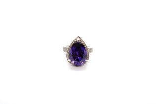 An 18ct white gold Uruguayan pear shape amethyst and diamond ring with diamond shoulders -