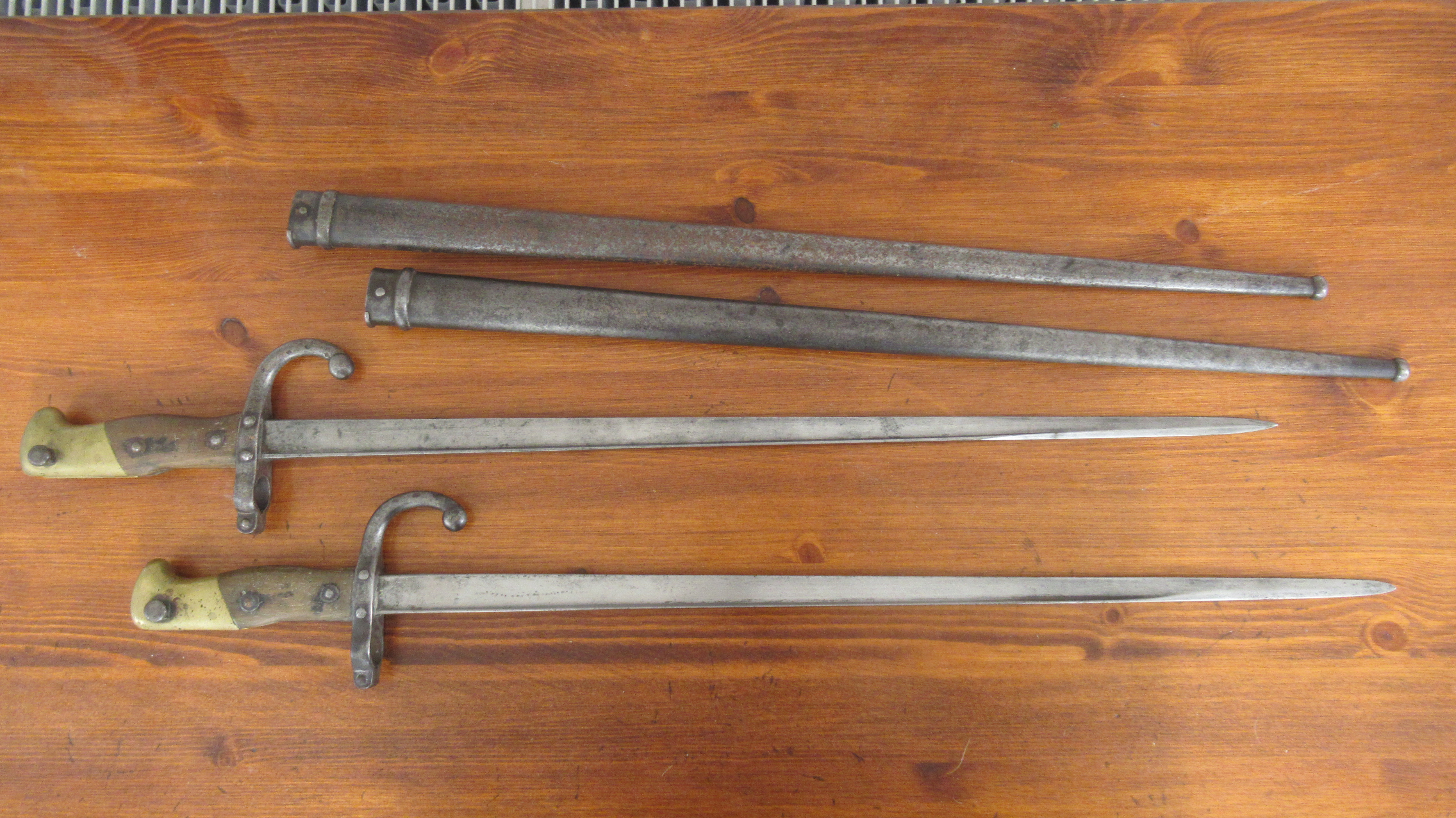 Two French 1874 pattern gras bayonets dated 1877 and 1879, 51cm blades with steel scabbards - Image 2 of 4