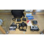 Assorted cameras, including Olympus 35RC, 4 Minolta lenses, filters etc.