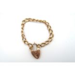 A 9ct yellow gold bracelet with heart lock, approx 24.7 grams