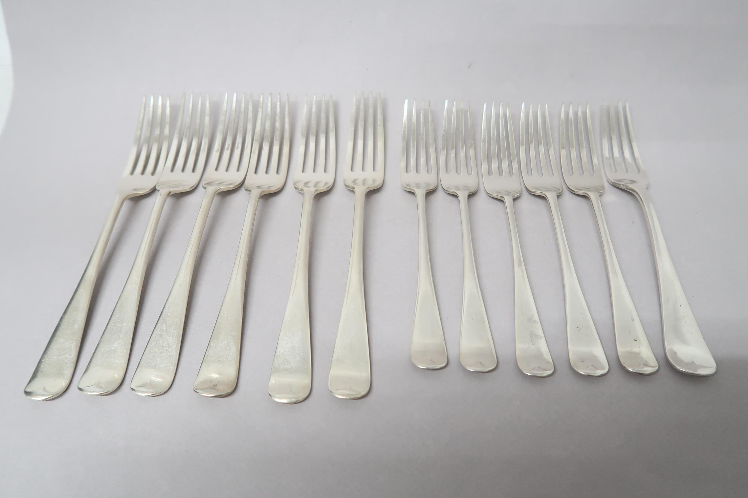 Twelve silver forks - approx weight 19.6 troy oz