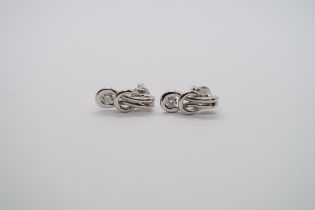 A pair of good quality 18ct white gold diamond Love Knot earrings, colour approx G/H, VS1, head size