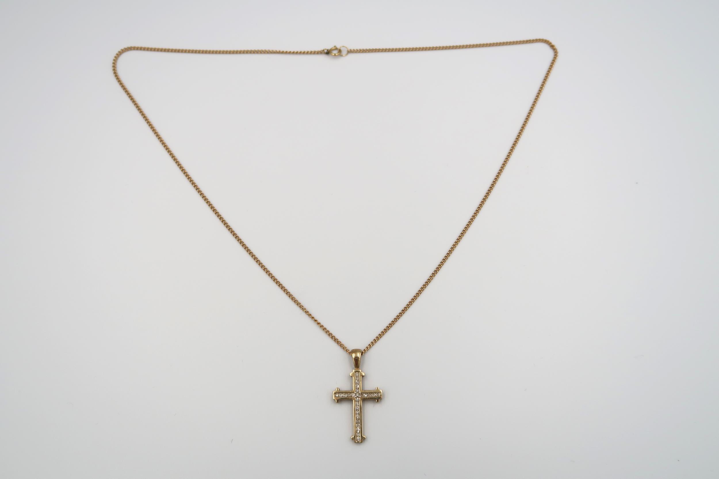 A 9ct yellow gold crucifix with 26 small cut diamonds on a 9ct gold chain, approx 5 grams - Image 2 of 4