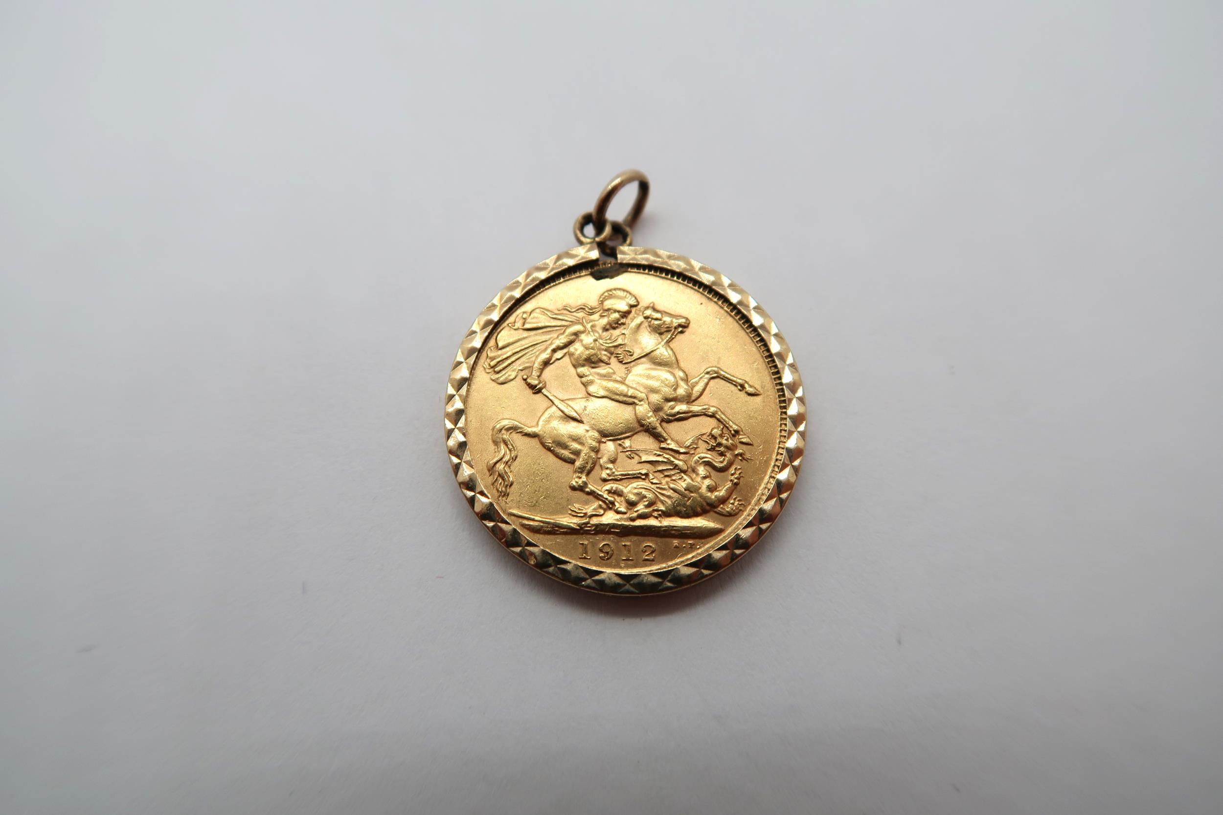 A George V Full Sovereign, Dated 1913, 8.97g with a 9ct yellow gold pendant mount.
