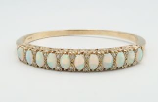 A 9ct and opal and diamond bracelet, approx 21.99 grams