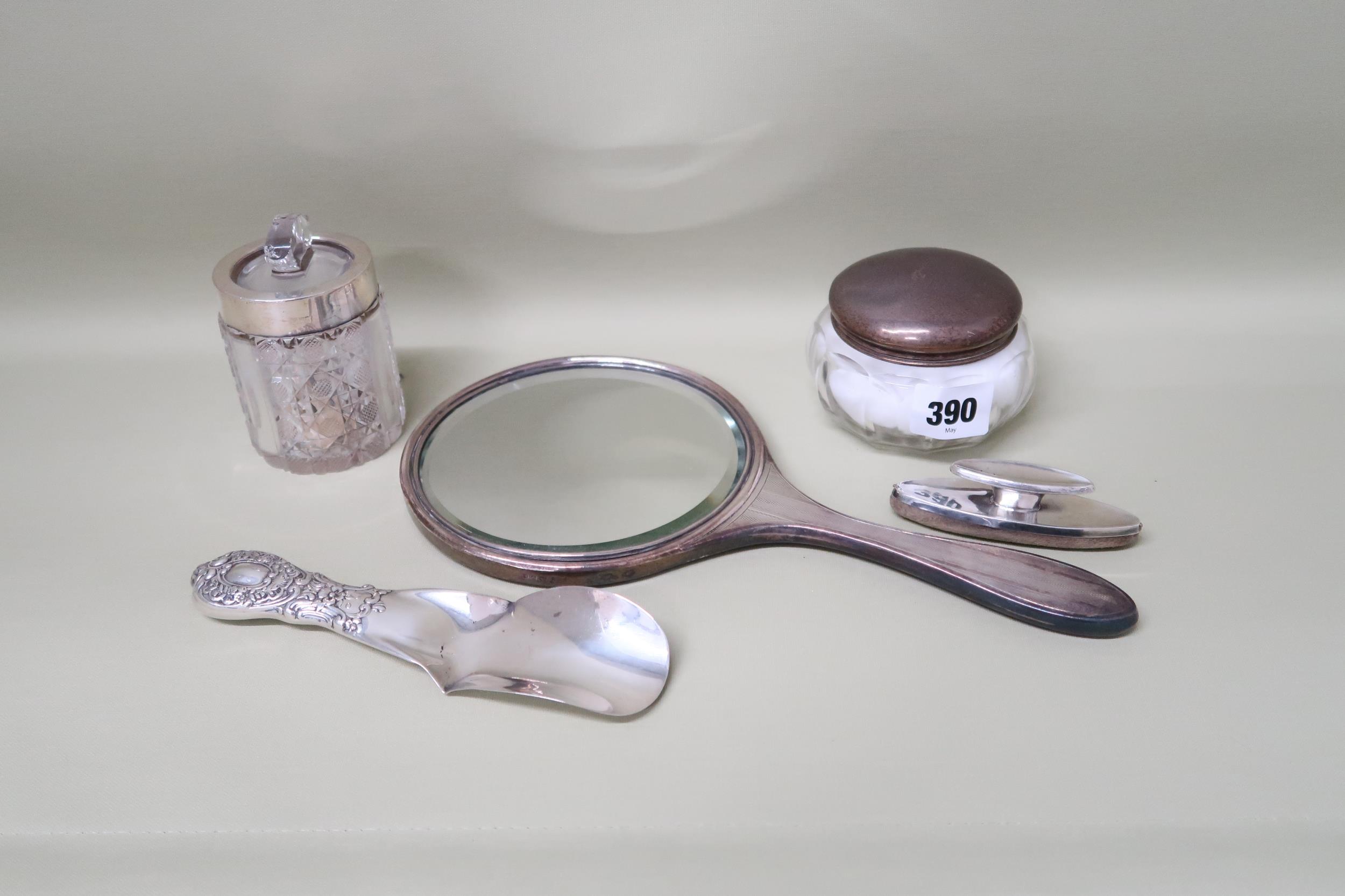 Silver hallmarked items including shoe horn, butter, hand mirror powder, cut glass pot with lid