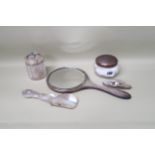 Silver hallmarked items including shoe horn, butter, hand mirror powder, cut glass pot with lid