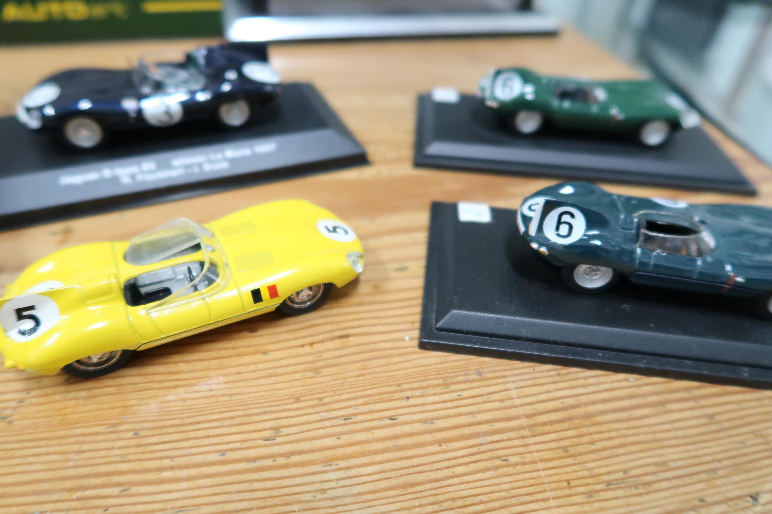 An Autoart Classic Division 1:18 model D type Jaguar, (boxed), an Autoart Jaguar XJB, a Tyrrell