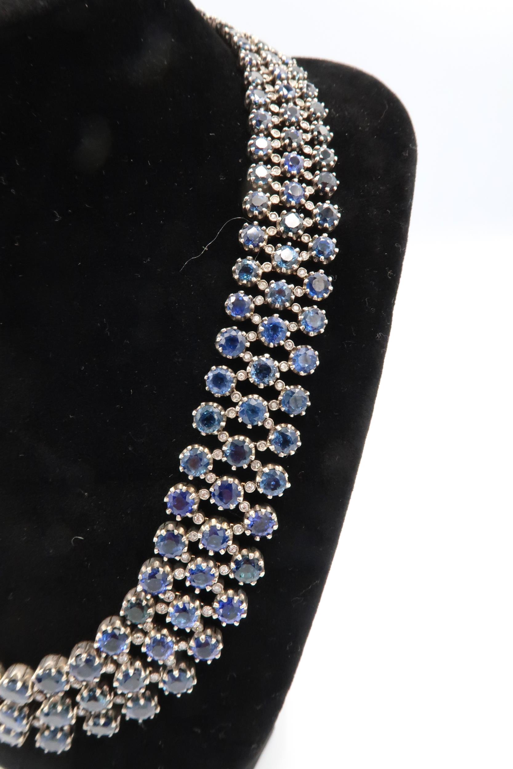 A stunning three row articulated sapphire and diamond necklace. The graduating circular claw set - Image 8 of 11