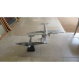 A large scale model of a Spitfire and one smaller painted example - size nose to tail 60cm and