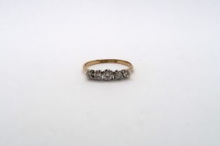 A five stone diamond ring - approx weight 1.89 grams - ring size P/Q