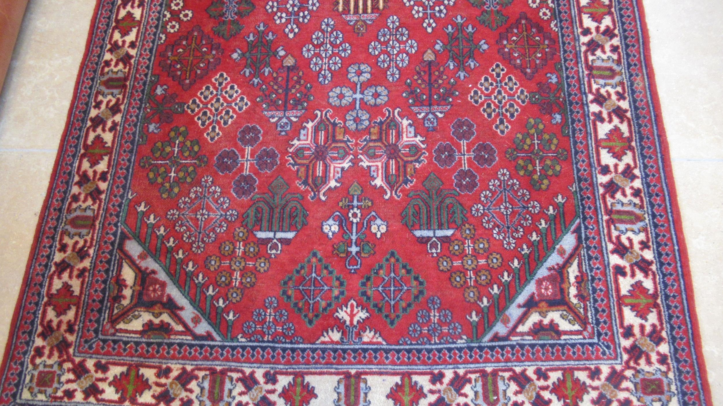 A handmade Meimah rug - 3.98cm x 1.85cm - Image 2 of 2