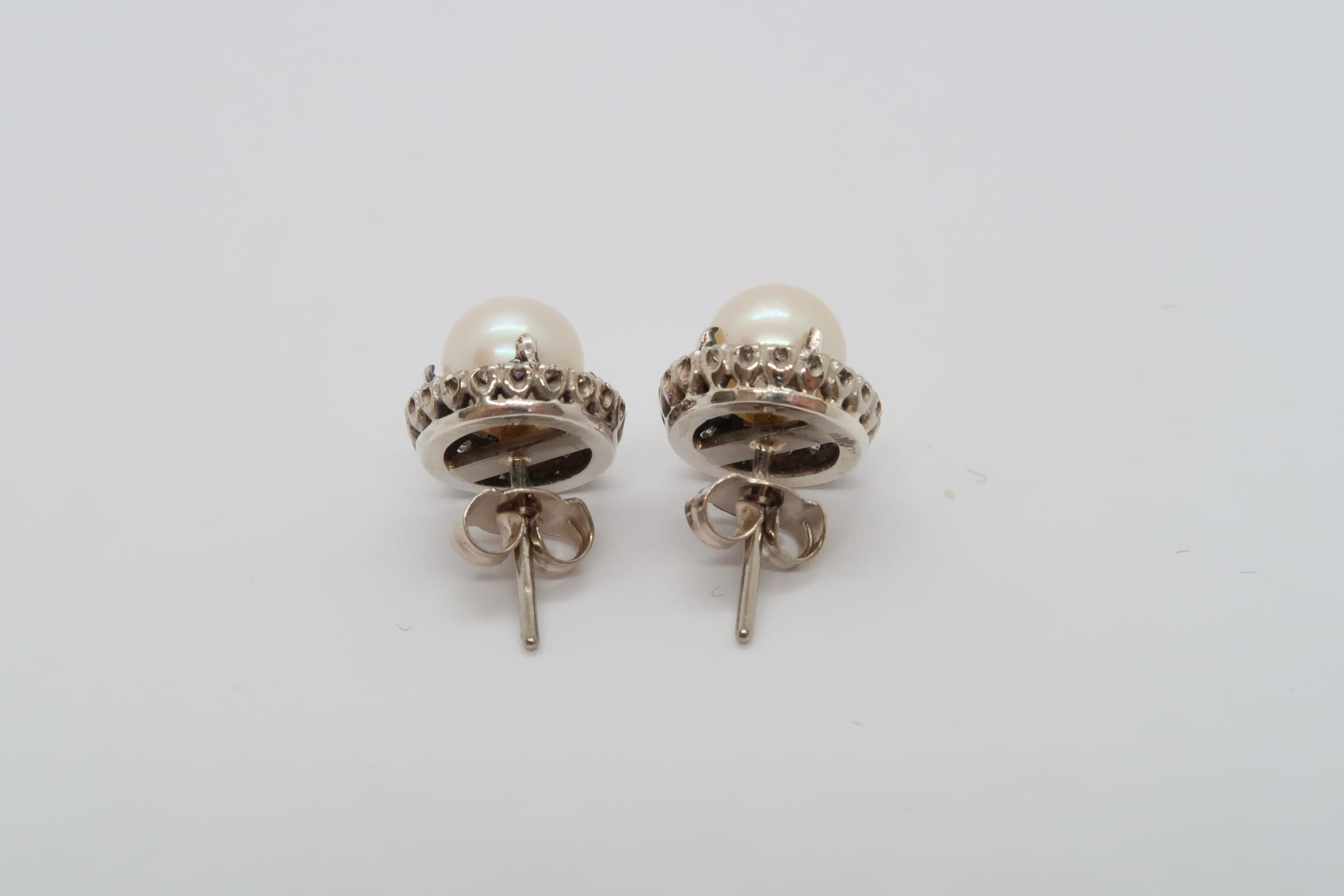 An 18ct white gold pearl and diamond earrings, head size approx 12mm diameter, pearls approx 8mm - Image 2 of 2